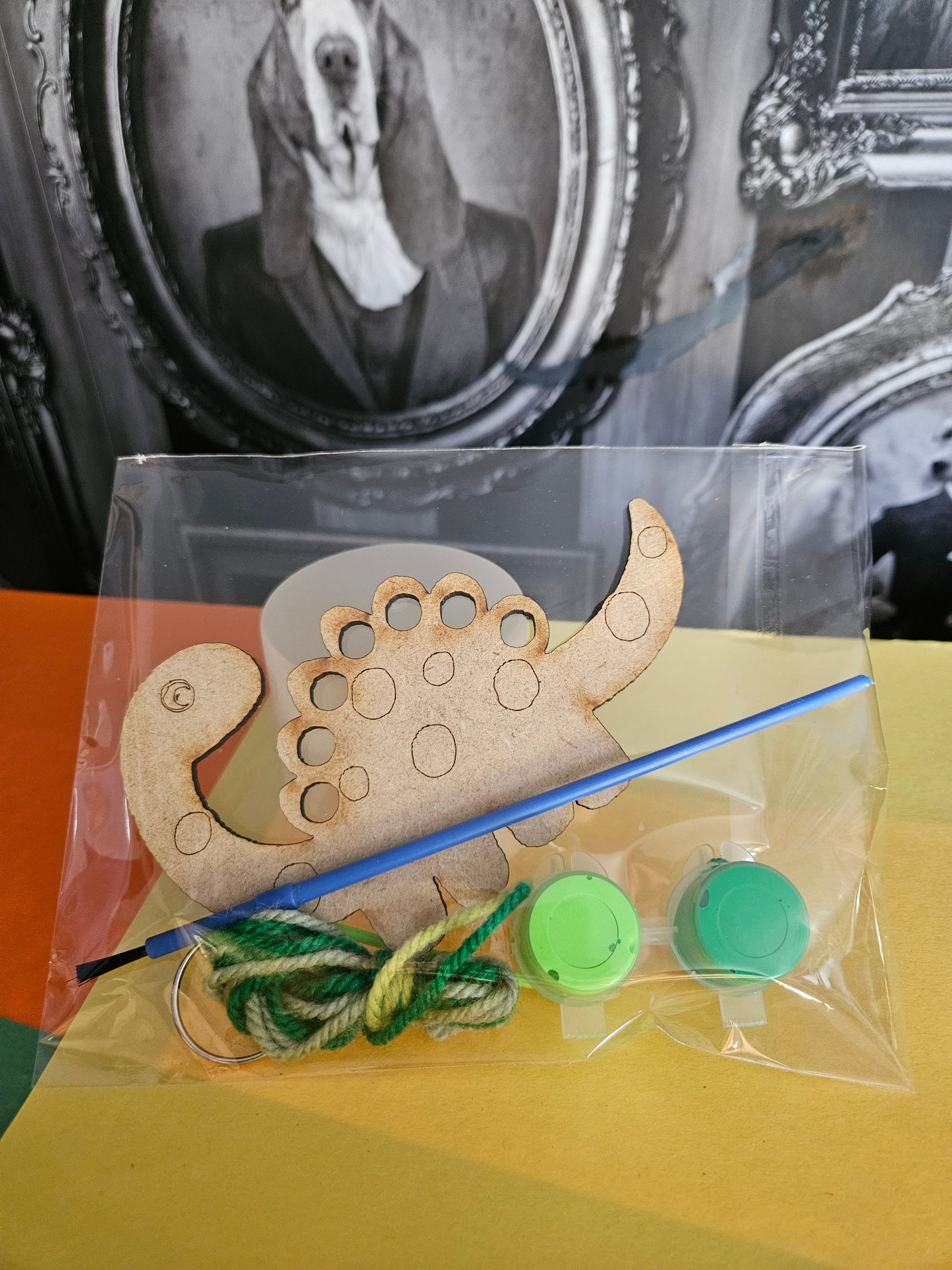 Paint and thread your own Dinosaur Keyring